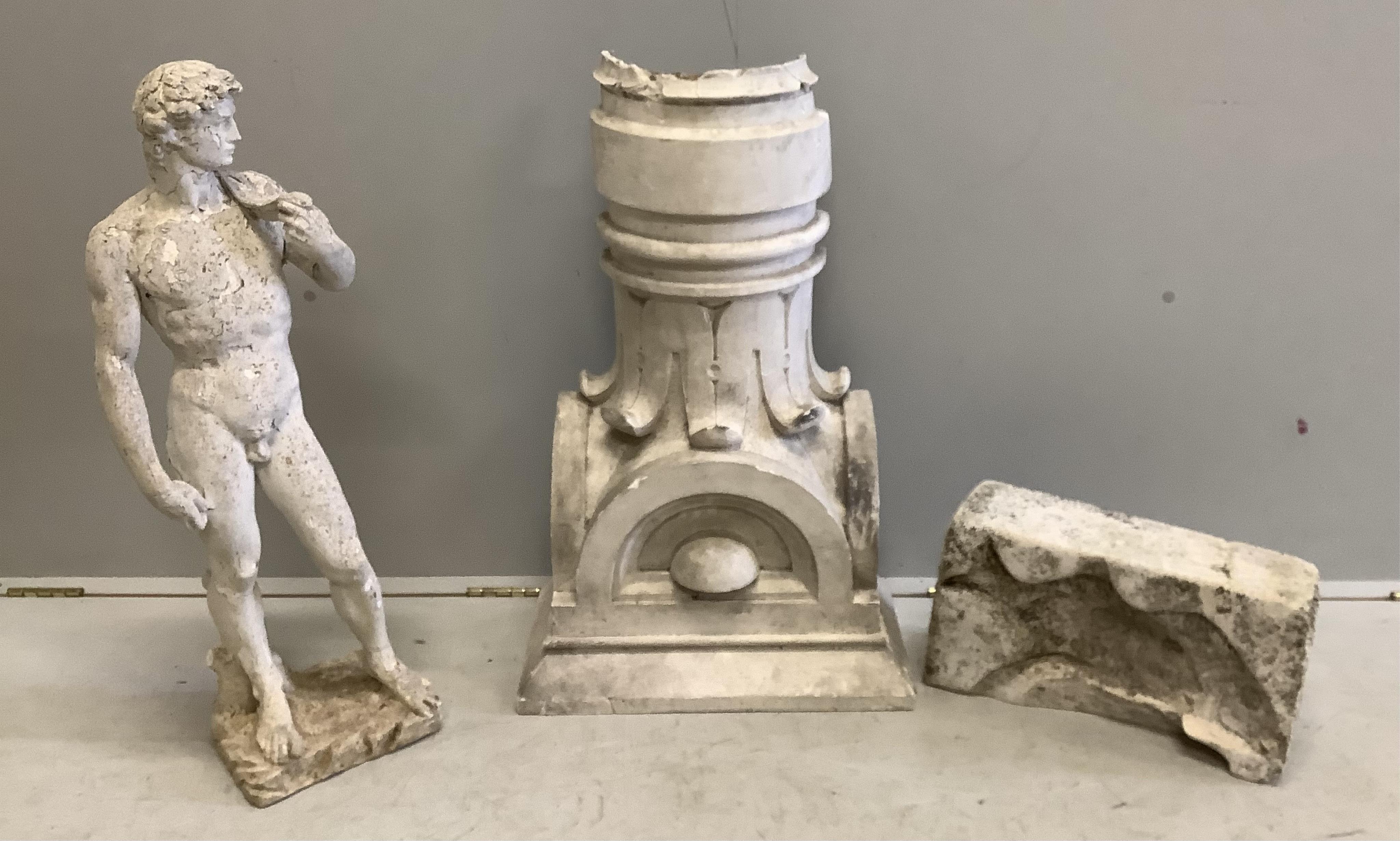 A plaster figure and three other items, largest height 76cm. Condition - poor to fair